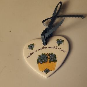 Heart-Shaped Ceramic Ornament with Floral Design